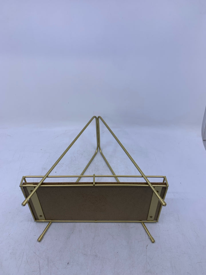 GOLD METAL TRIANGLE SHAPED SMALL SHELF.