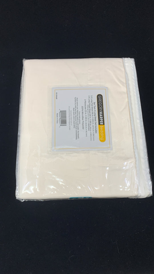NIP TWIN XL CREAM SHEET SET.