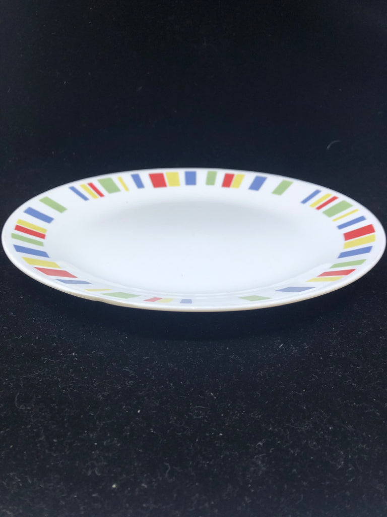 4 WHITE CORELLE DINNER PLATES W/MULTI COLOR SQUARES.