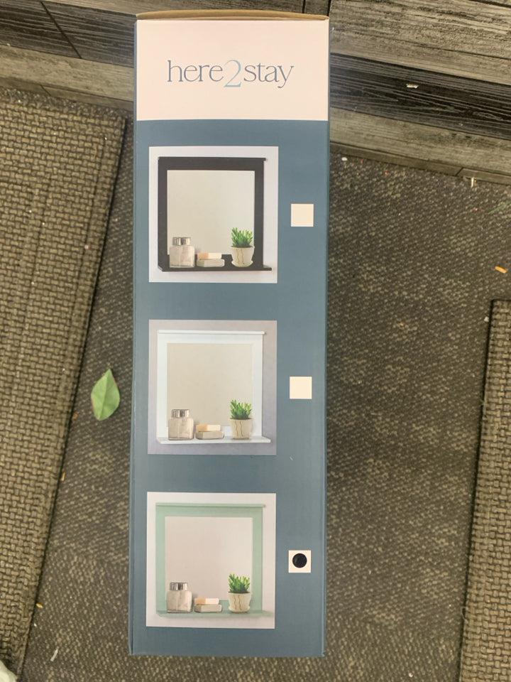 NIB WALL SHELF WITH MIRROR.