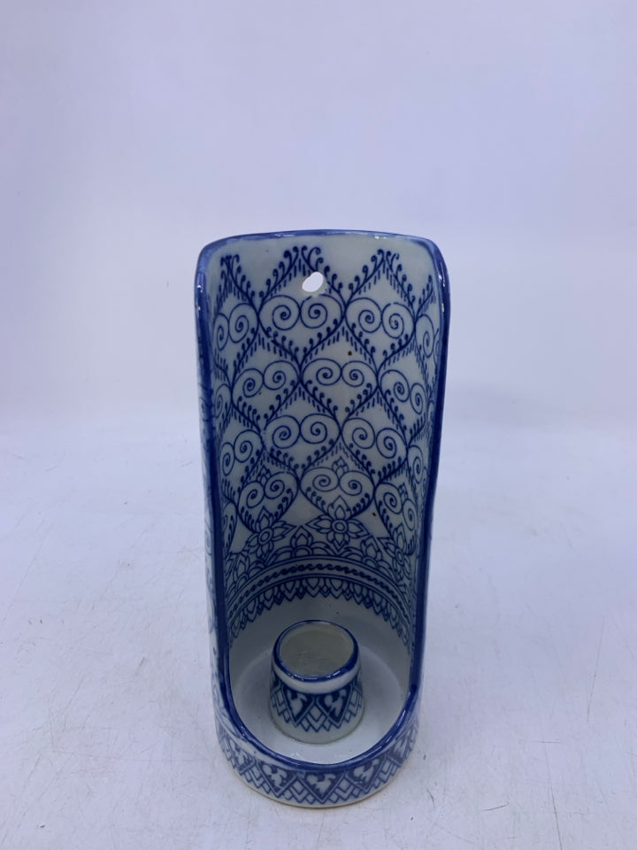 BLUE WHITE DESIGNS TAPERED CANDLE HOLDER.