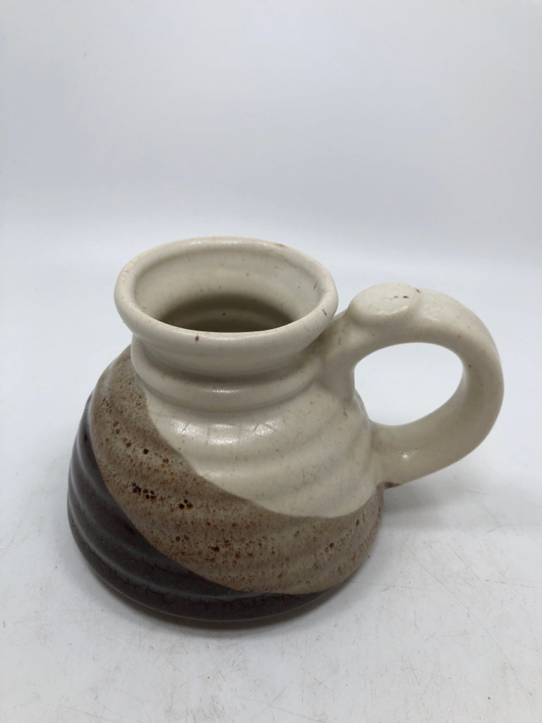 BROWN/CREAM GLAZED NON SLIP POTTERY MUG.