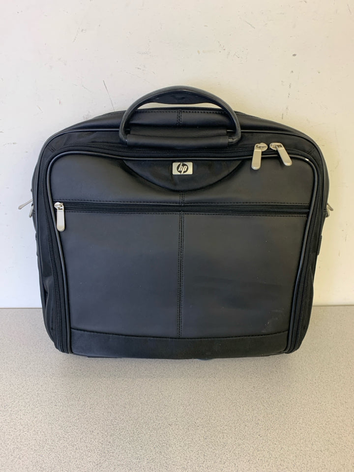 BLACK FAUX LEATHER COMPUTER BAG.