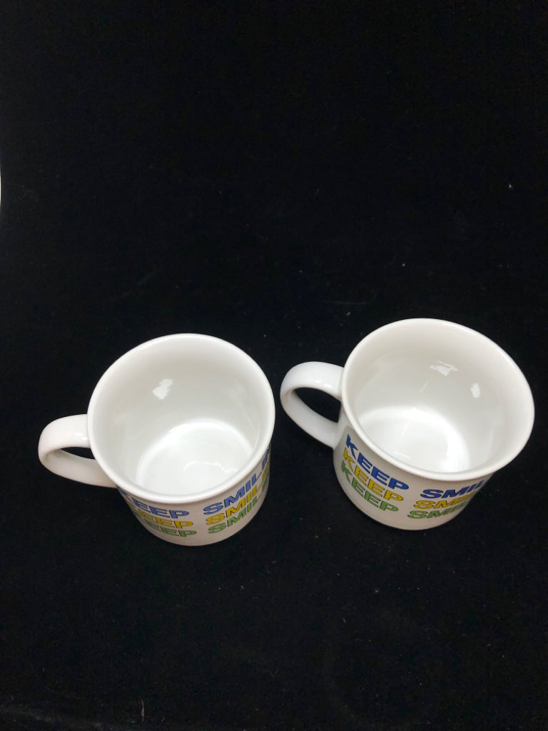 2 'KEEP SMILING' SANDRA BOYNTON MUGS.