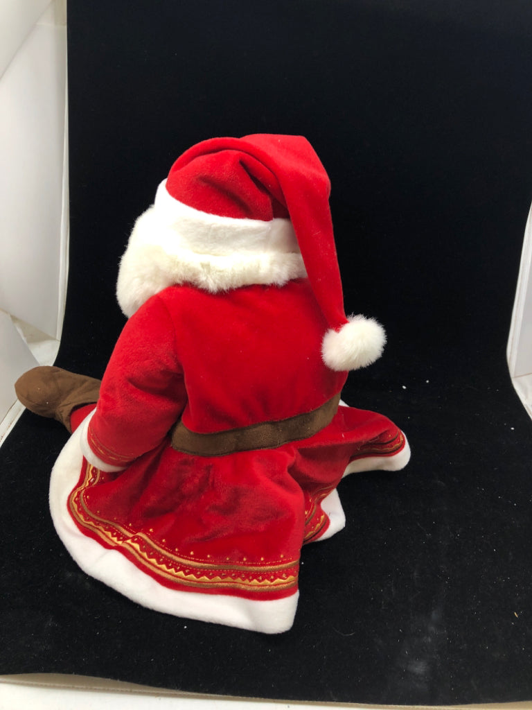 SINGING PLUSH SITTING SANTA RED COAT.