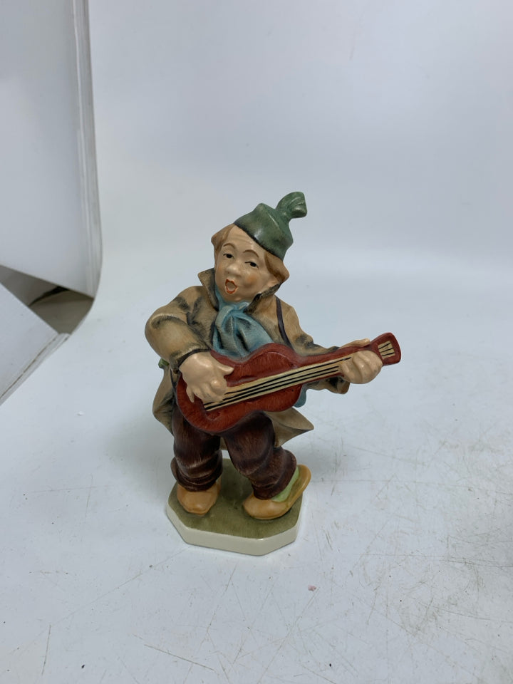VTG FRIEDEL GERMAN MAN PLAYING GUITAR.