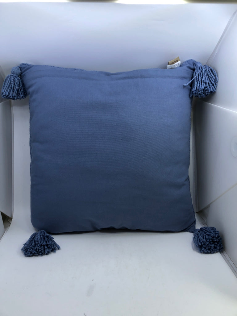 LT BLUE PILLOW W/TASSLES.