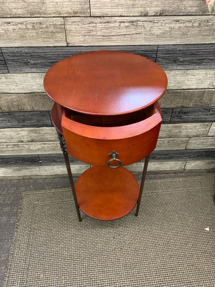 VTG ROUND RED WOOD END TABLE W/ DRAWER.