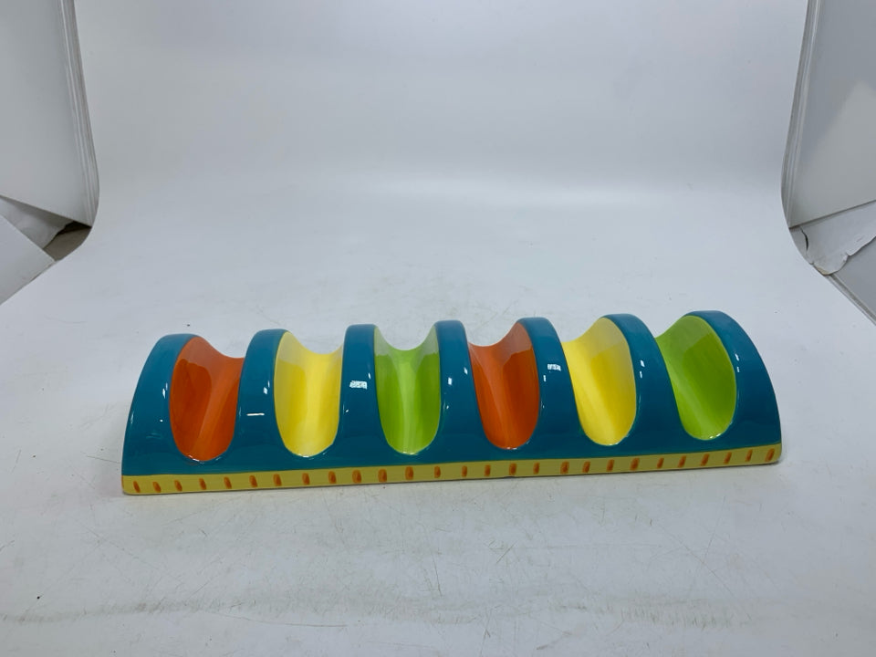 CERAMIC COLORFUL TACO SHELL HOLDER.