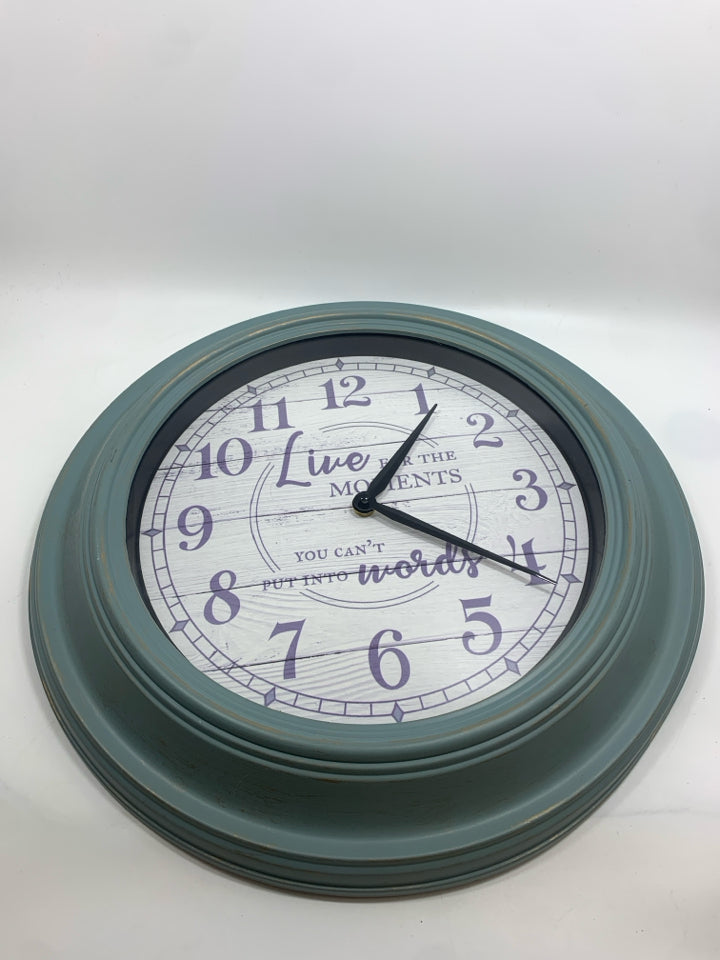 LIVE FOR THE MOMENTS TEAL WALL CLOCK.