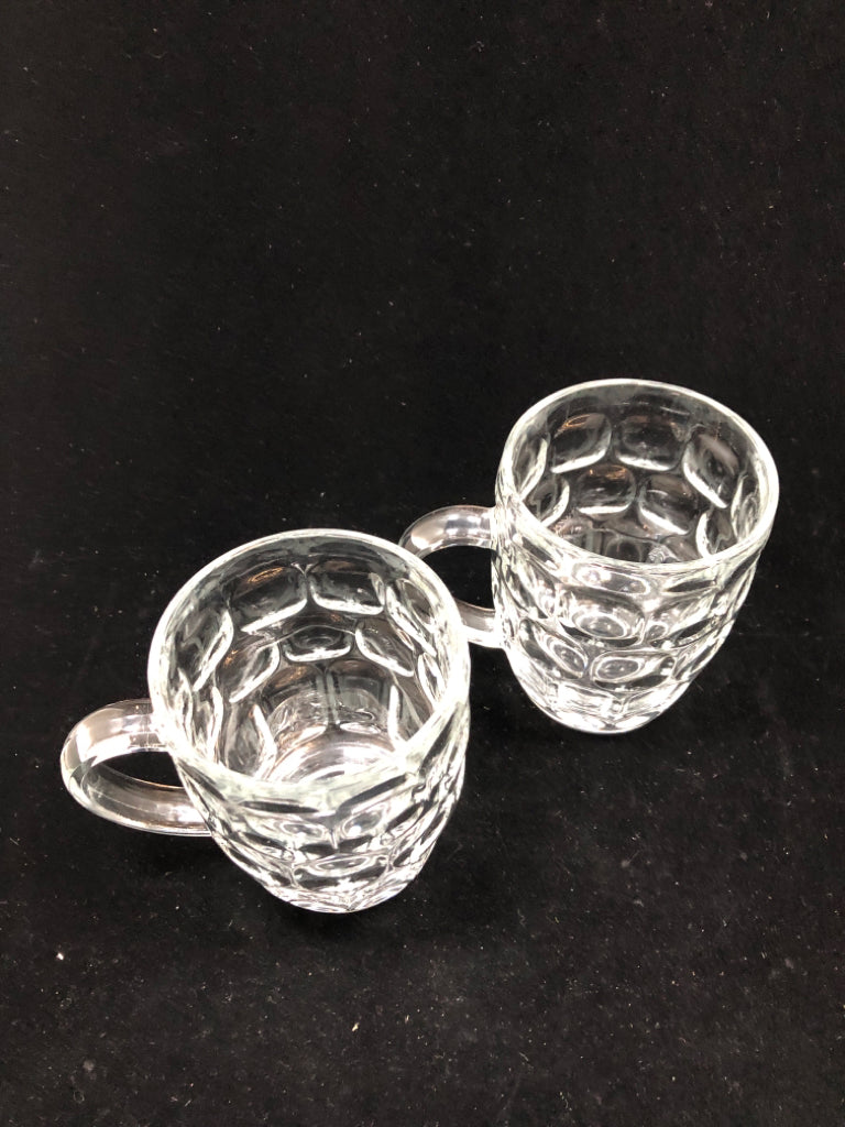 2 THUMBPRINT CUT GLASS MUGS.