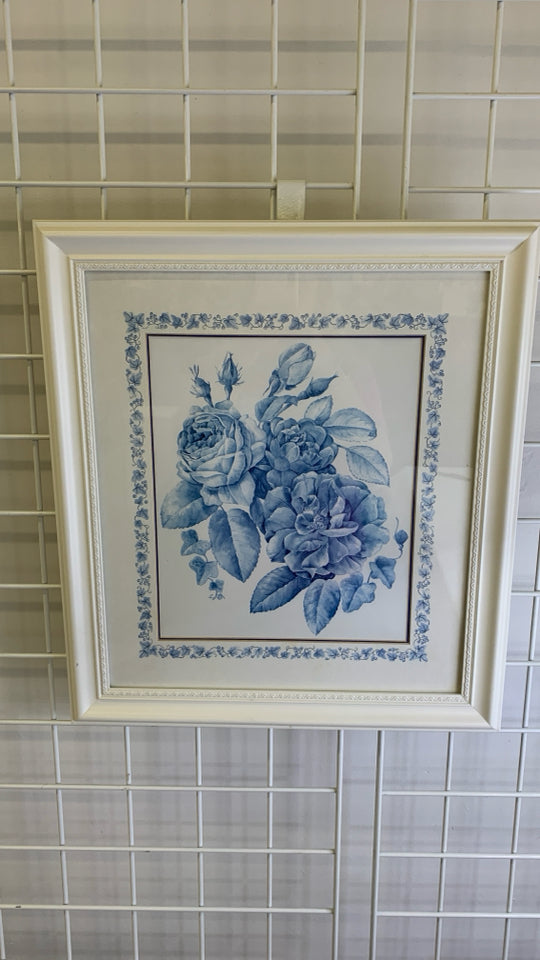 BLUE FLOWERS IN WHITE BACKGROUND IN WHITE FRAME WALL ART.