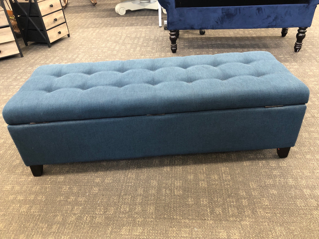 BLUE FABRIC STORAGE BENCH.