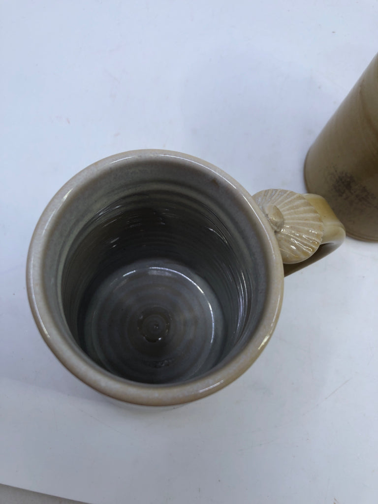 2 YELLOW + BLUE POTTERY GLAZE MUGS.