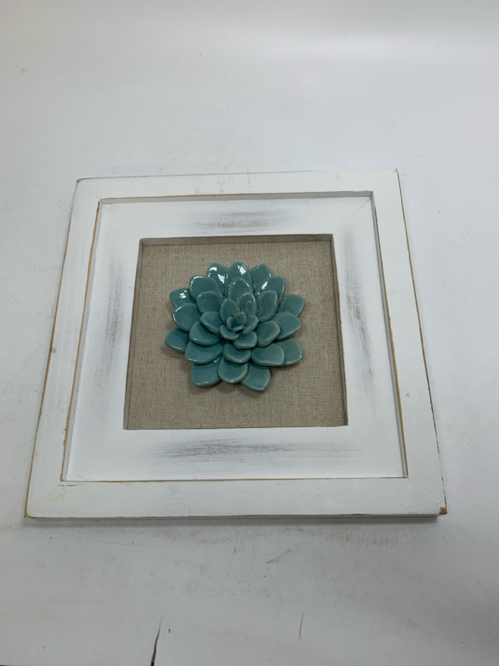 WHITE FRAME W/ CERAMIC SUCCULENT WALL HANGING.