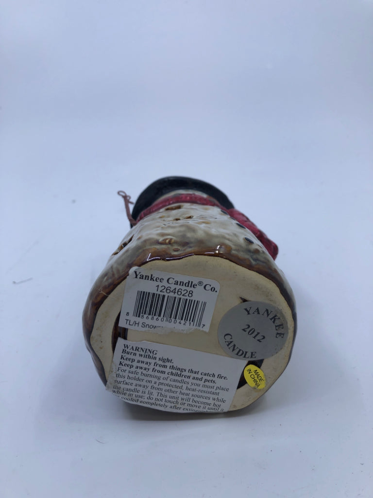 BROWN TEXTURED SNOWMAN TEA LIGHT HOLDER W RED SCARF.