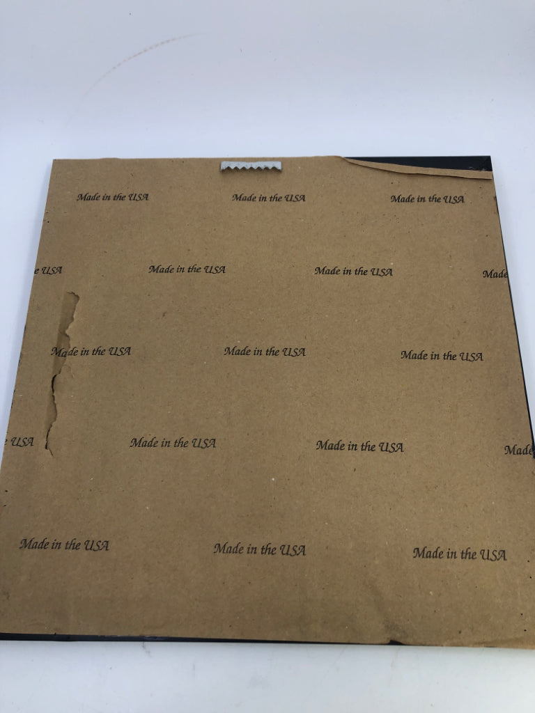 TAN IRIS FLOWER SHADOWBOX ART IN DK WOOD FRAME.