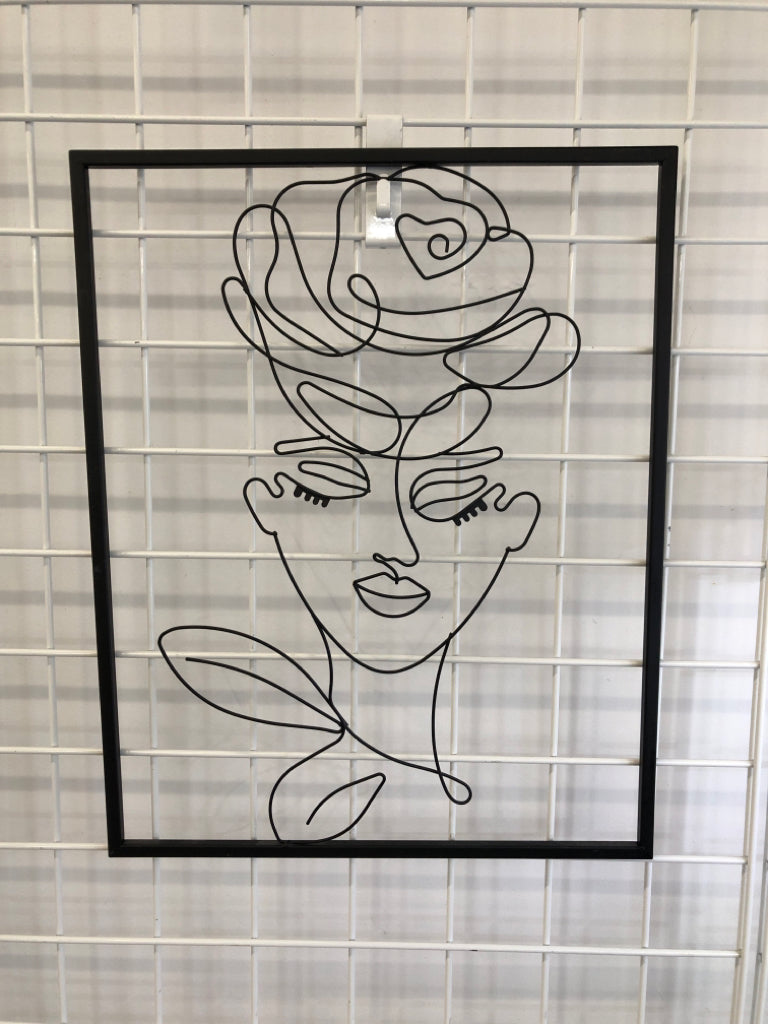 BLACK METAL LADY WITH HAT WALL ART.