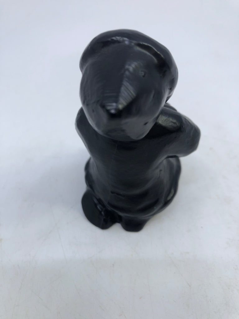 GIRL IN SNOW-COAT HUGGING ANIMAL HAND CARVING COLUMBIA COAST ARTWARE.