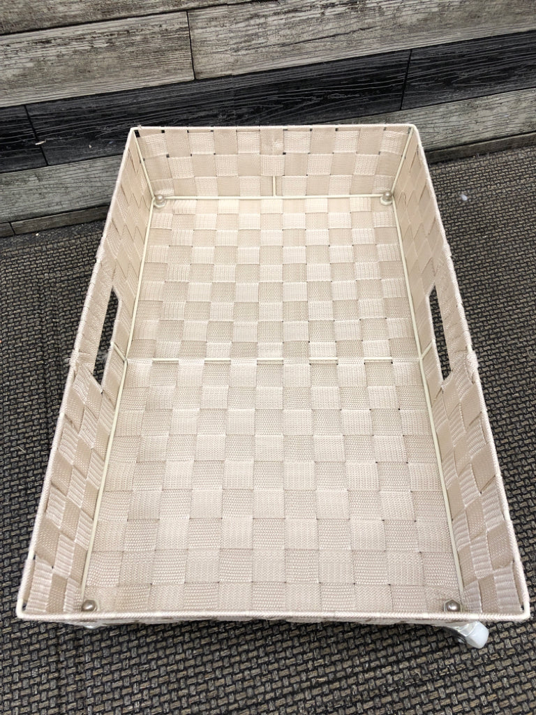 LIGHT ROSE UNDER BED STORAGE W WHEELS.