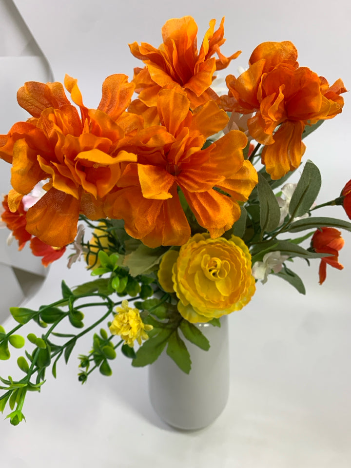 ORANGE & YELLOW FLORALS IN CERAMIC VASE.