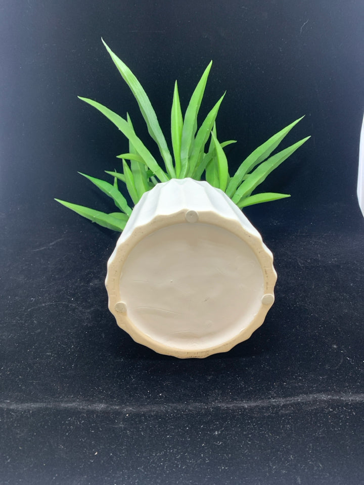 FAUX SUCCULENT IN WHITE POT.