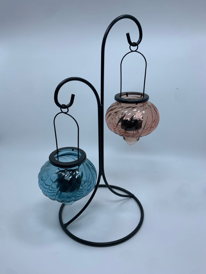 METAL TEA LIGHT HOLDER W/BLUE AND PINK GLASS VOTIVE GLOBES.