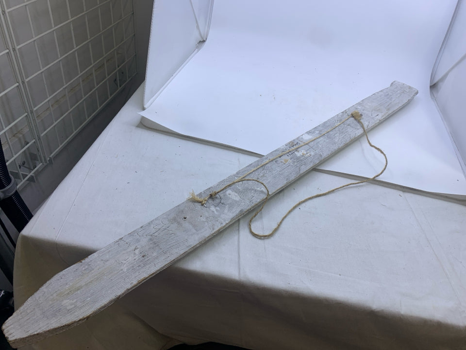 WHITE DISTRESSED CEREMONY ARROW SIGN.