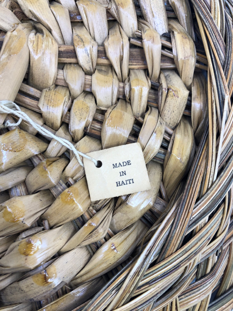SHALLOW BRAIDED TWO TONED BASKET CENTERPIECE.