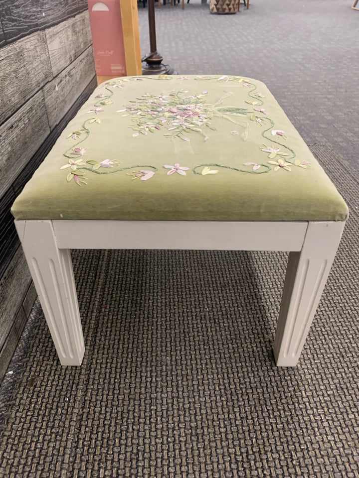 GREEN EMBROIDERED FOOT STOOL W WHITE LEGS.