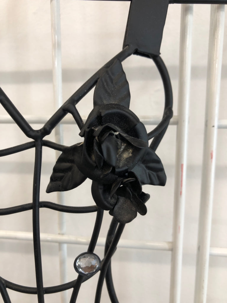 BLACK METAL DRESS WALL DECOR.