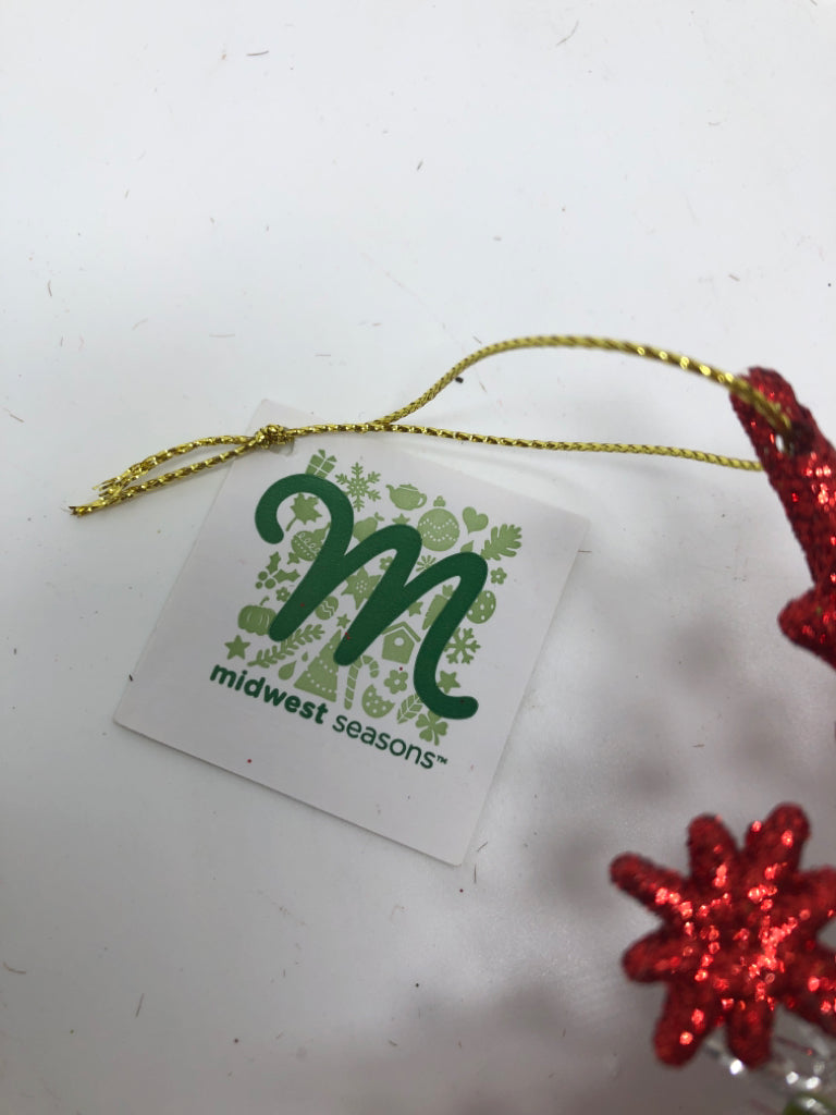 RED GLITTER SNOWFLAKE ORNAMENT W/SILVER BELLS.