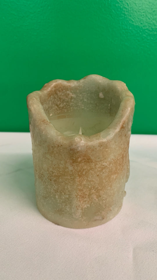 FAUX LIGHT UP BATTERY CANDLE.
