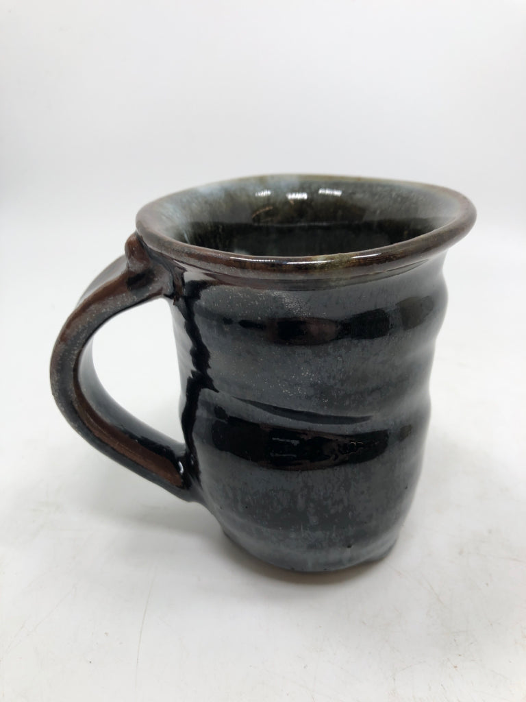 HAND SPUN BLACK GLAZED POTTERY MUG.