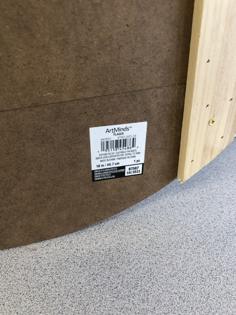 MULTI-TONED WOOD PLAQUE.