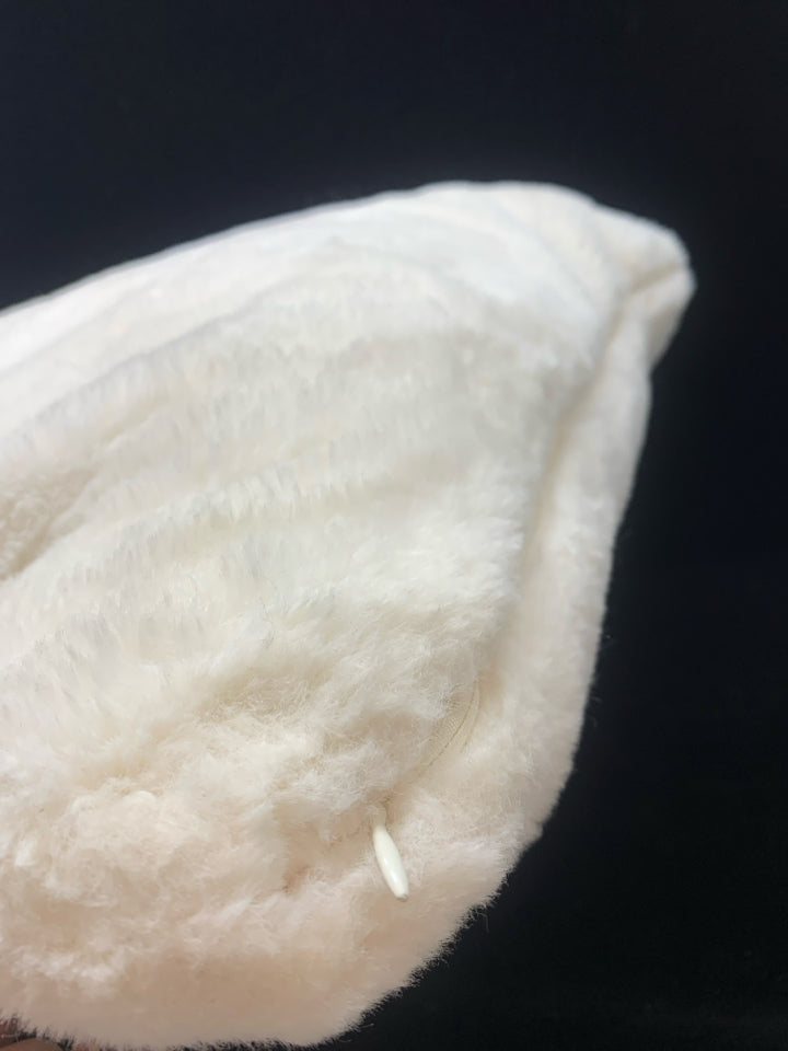 FLUFFY WHITE PILLOW.