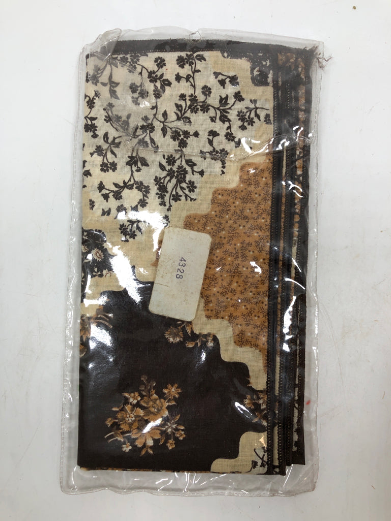 4 NIP FLORAL NAPKINS.