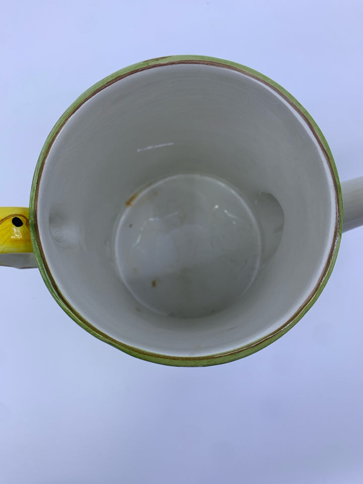 YELLOW AND GREEN DECORATIVE WATERING CAN.
