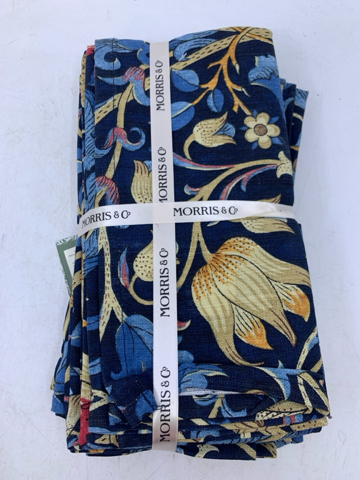 NIP 8 DARK BLUE W/ ASSORTED FLORAL NAPKINS.
