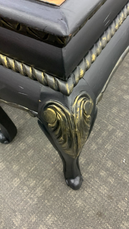 BLACK CONSOLE TABLE W/ TWO TONED STAINED INLAY.