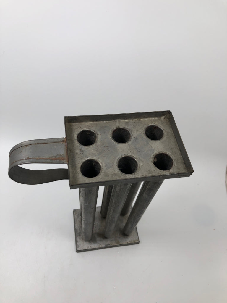 VTG METAL MULTI-TUBE TAPER CANDLE MOLD.