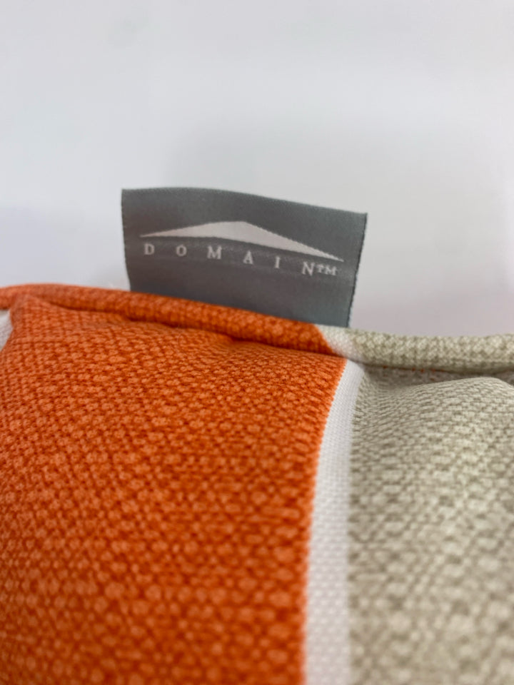 ORANGE & CREAM DOMAIN STRIPED PILLOW.
