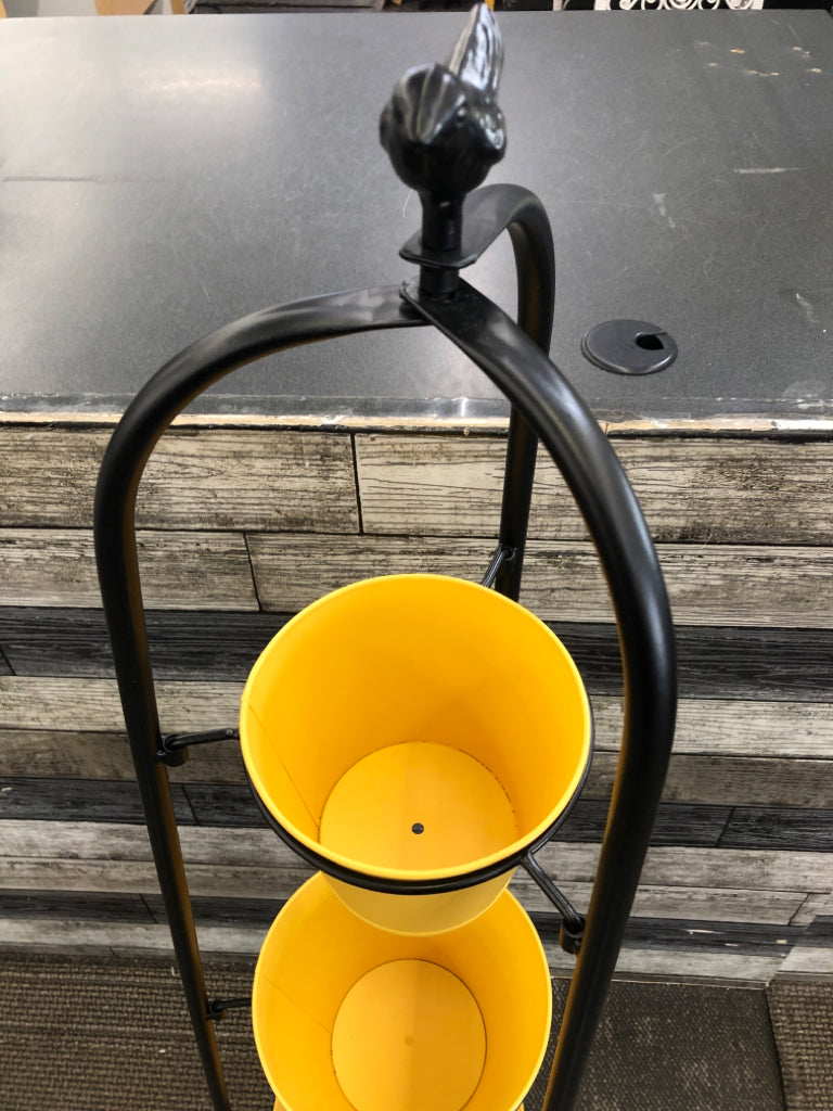 BLACK 3 LEG PLANT STAND W/3 YELLOW POTS.