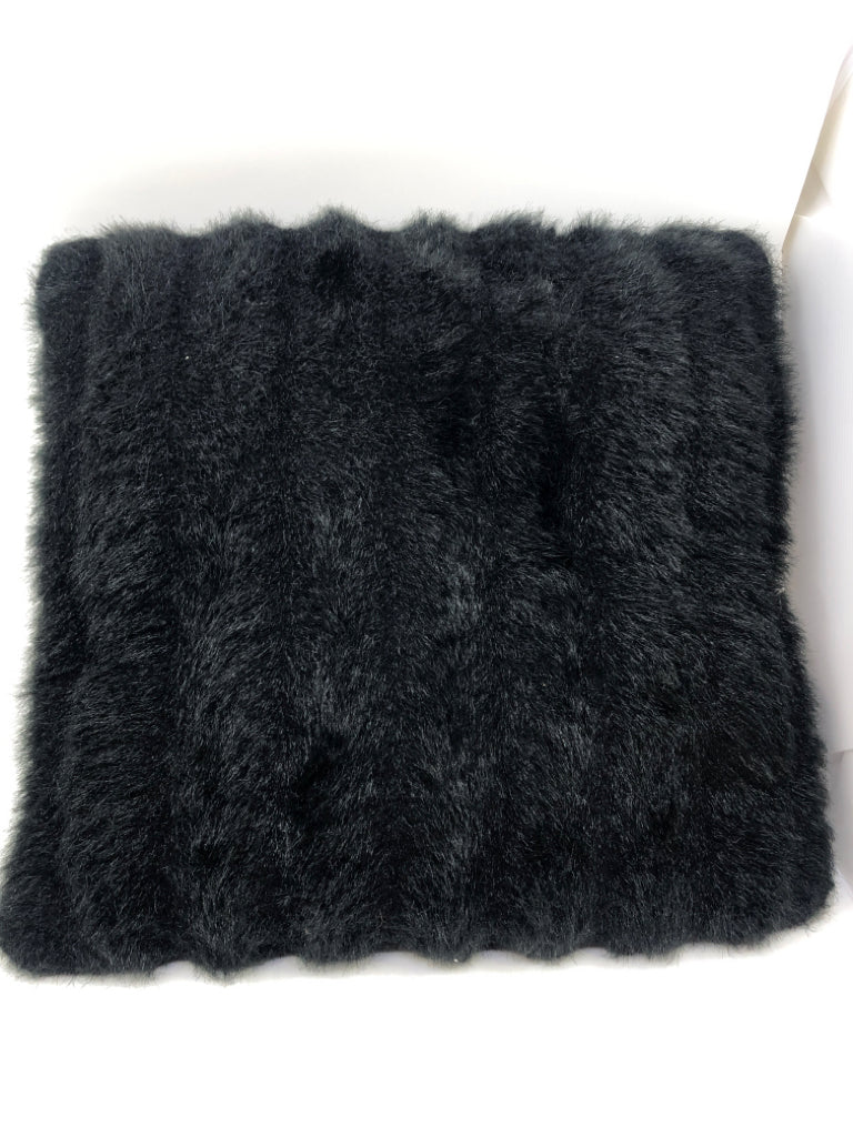 BLACK FUZZY PILLOW.