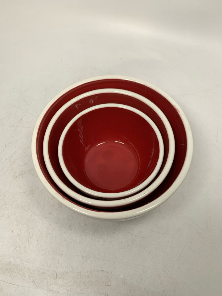 3 NESTING RED WHITE STRIPED BOWLS W/ SNOWFLAKES.