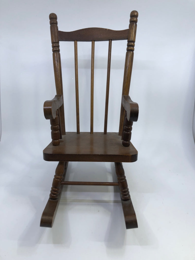 DOLL DARK WOOD ROCKING CHAIR.