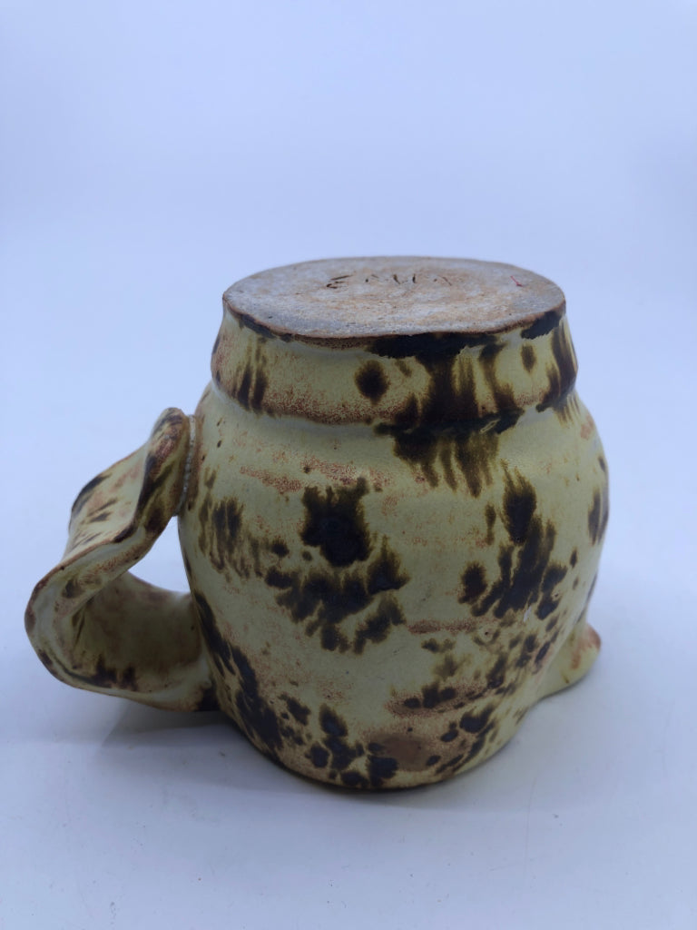 BROWN AND YELLOW COW PATTERN CREAMER.