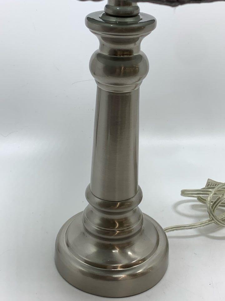 SILVER METAL BASE LAMP W/GREY PLEATED SHADE.