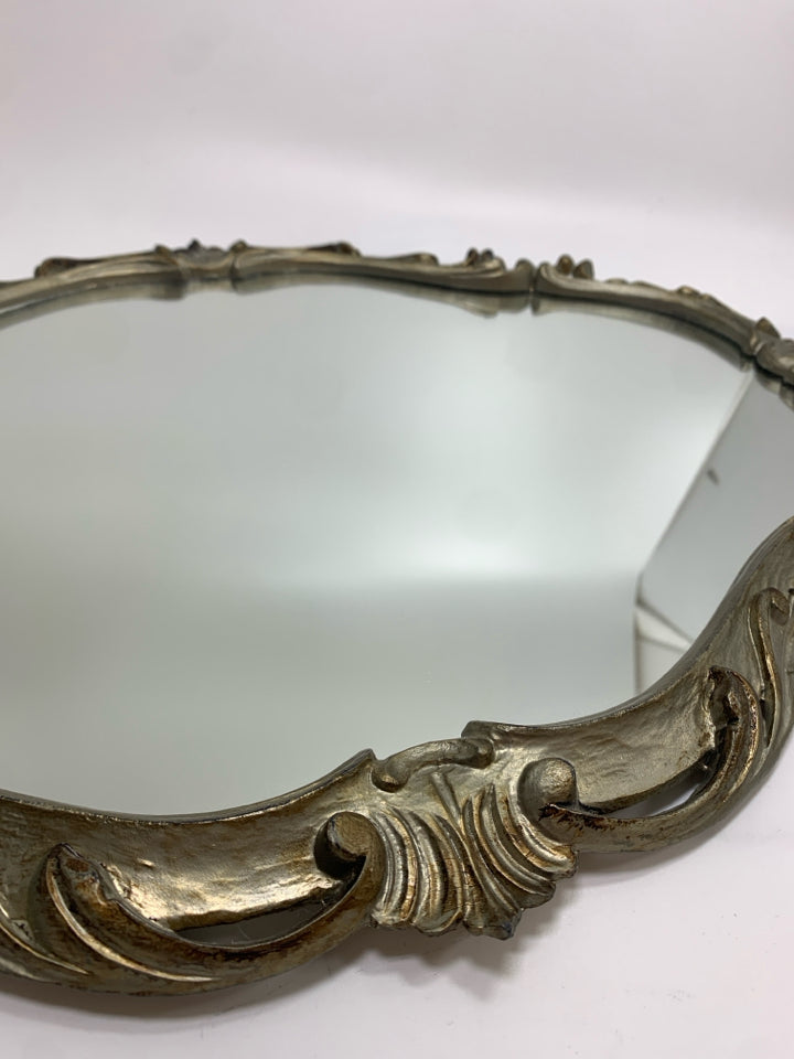 ORNATE SILVER FRAMED OVAL MIRROR.