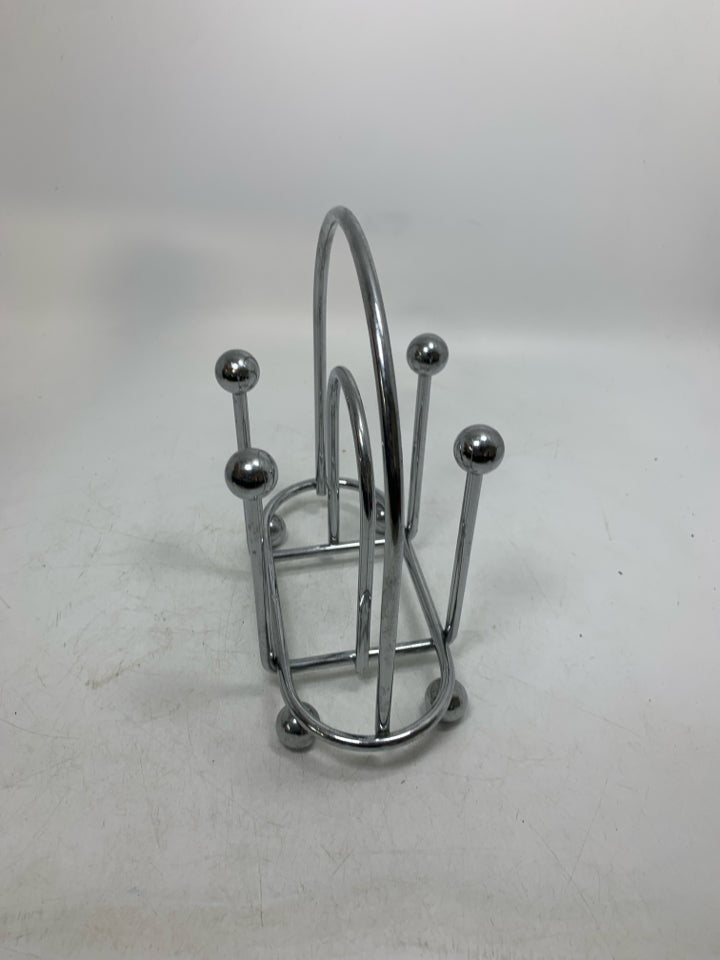DOUBLE METAL HEAVY NAPKIN HOLDER.